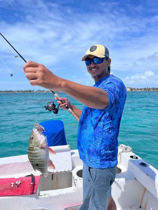 Pêche sur les récifs, plongée avec tuba et barbecue sur la plage à San Pedro, au Belize.