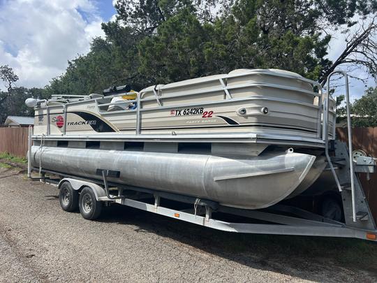 This Sun Tracker Party Barge at Canyon Lake … runs good but upholstery is weak.