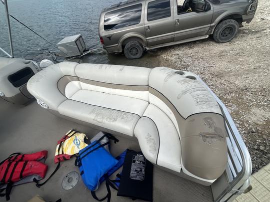 This Sun Tracker Party Barge at Canyon Lake … runs good but upholstery is weak.