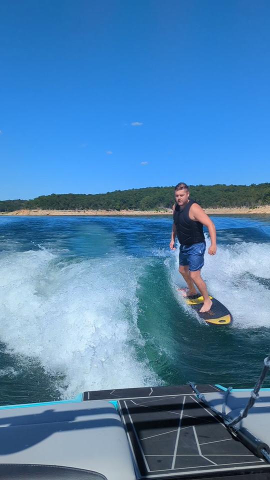 Captained Championship Wakesurf Boat for Cruise/Surf/Swimming at Beaver Lake