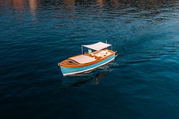 Portofino's Jewel: Cruise in Style with Our Ginca Classic Boat