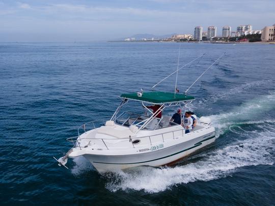 Lancha a motor Pro-Line de 32 pies para su escapada en el mar en Puerto Vallarta.