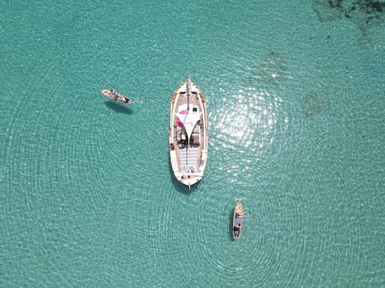 Mykonos Morning Cruise On A Private Traditional Wooden Boat