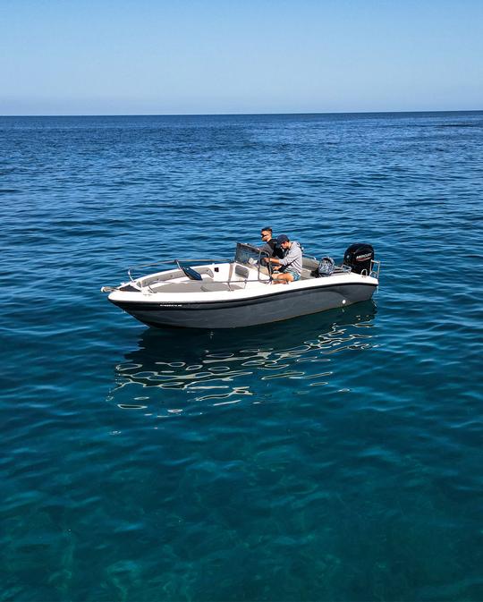 Rent  the Karel Open boat and cruise Skiathos island  with your family