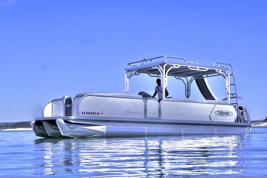 Tritoon à deux étages avec toboggan aquatique sur le lac Travis