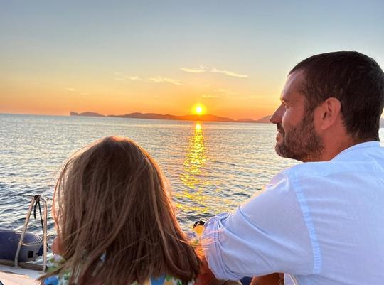 Sail into the Sunset: Mini Sailboat Tour in Alghero with Captain Sergio!