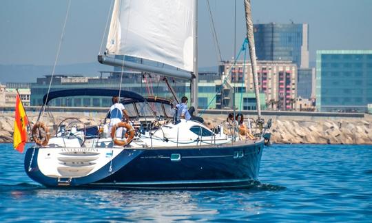 Voilier de luxe Jeanneau Sun Odyssey 54 DS à coque bleue à Barcelone