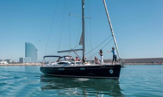 Voilier de luxe Jeanneau Sun Odyssey 54 DS à coque bleue à Barcelone