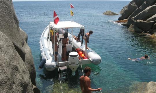 Passeios de mergulho de barco e curso PADI em Villasimius