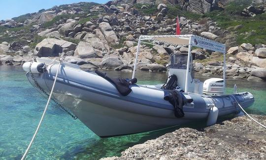 Passeios de mergulho de barco e curso PADI em Villasimius