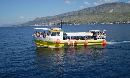 Passeios de pesca de barco 'Omisanin' em Omiš, Croácia