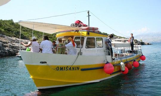 Passeios de pesca de barco 'Omisanin' em Omiš, Croácia