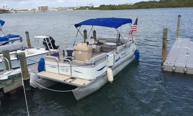 Summer Fun. 20ft Sweetwater Pontoons and sun