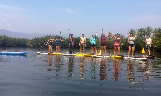 Desfrute de aulas e passeios de stand up paddleboarding em Kampo, Combodia