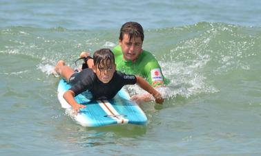 Aulas de surfe na Toscana, Itália