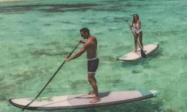 Alugue uma prancha de stand up paddleboard na cidade de Addu, Maldivas