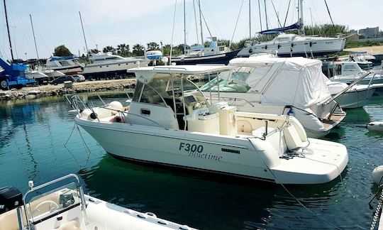 Boating Expedition Aboard 8 Person Cuddy Cabin/Walk Around in Gallipoli, Puglia