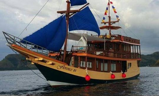 Explore Barat, Indonesia with family and friends aboard this 89' traditional phinisi boat