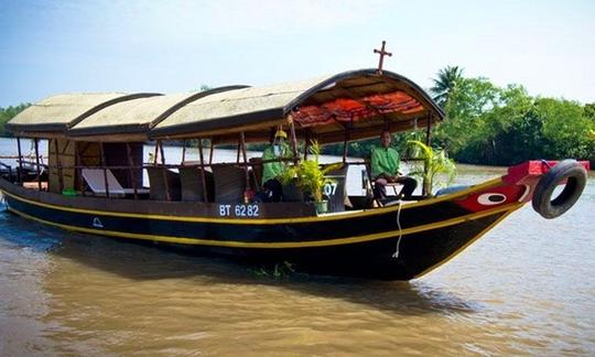 Boat ride on the main Mekong River Vietnam