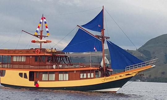 Explore Barat, Indonesia with family and friends aboard this 89' traditional phinisi boat