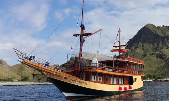 Explore Barat, Indonesia with family and friends aboard this 89' traditional phinisi boat