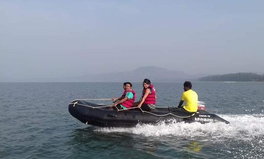 Passeio de barco para 6 pessoas na praia de Diveagar