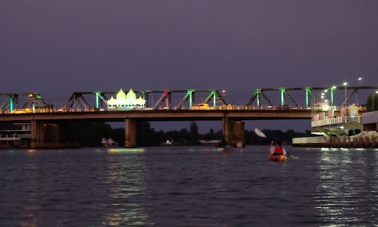 Night Kayaking at the Bridge, MaeKlong river, Ratchaburi province, Thailand