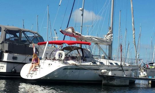 Private Sailing Trips in Canary Islands with Captain Dennis onboard First 45F5 Sailing Yacht