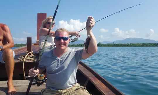 A husband and wife fishing in the Khao Lak Mangroves