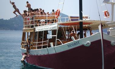 Traditional Wooden Leut Motor Boat For Rent With The Crew To Cruise Around Dubrovnik And Discover The Islands Or Just Enjoy In Sunset Cruise