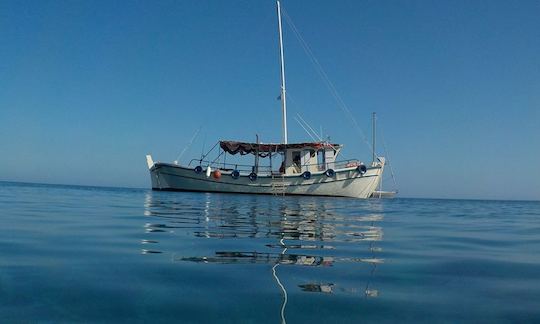 All Day Tour - Swim in the caves and explore a wreck in Plimmiri