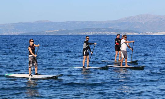 Aluguel de stand up paddleboard por hora a meio dia em Bol