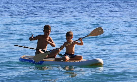 Aluguel de stand up paddleboard por hora a meio dia em Bol