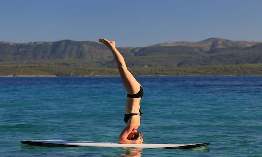 Aluguel de stand up paddleboard por hora a meio dia em Bol