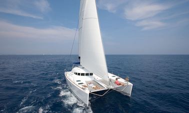 Glide Across Azure Waters on a 38ft Lagoon Catamaran w/ Space for 14 Adventurers