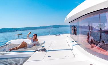 Lagoon 42 Cruising Catamaran Charter for 12 People from Furnari, Sicilia