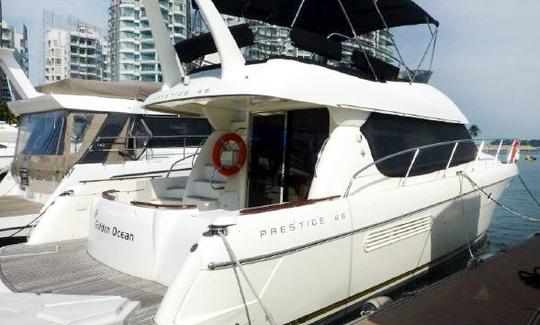 Yacht à moteur Prestige de 47 pieds à louer avec skipper à Singapour