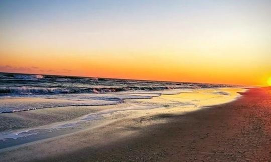 The oceanside at dusk.