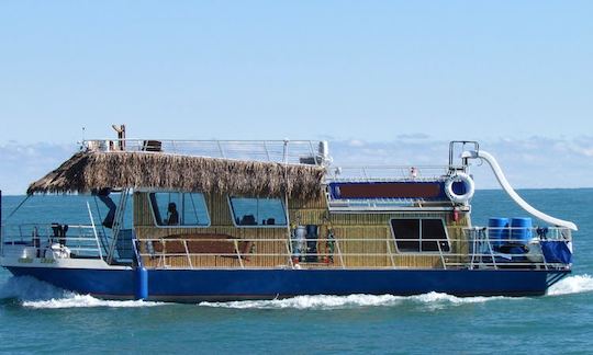 Tiki Themed Party Boat, 18-36 Guests, captain, crew & beverage package included