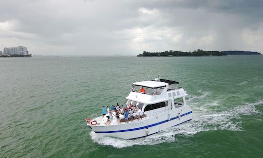 Custom Built 57 feet flybridge cruiser yacht for rent with skipper in Singapore