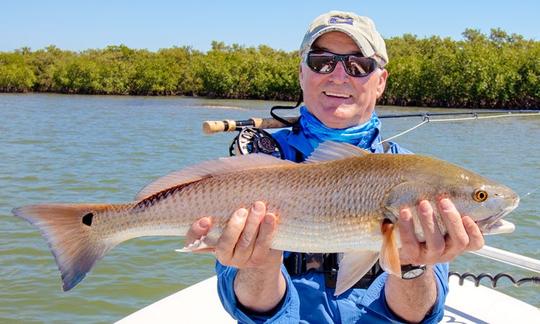  Pesca turística en las llanuras de agua salada cerca de Daytona Beach