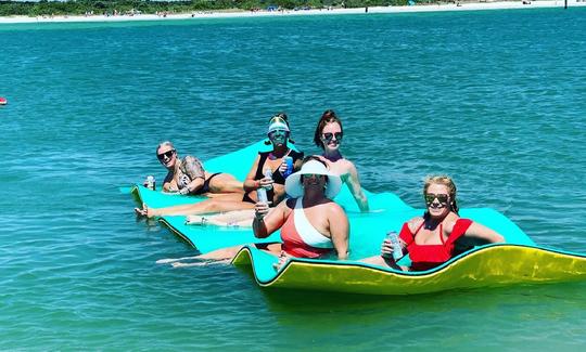 Lounge on our 18ft Float Mat.