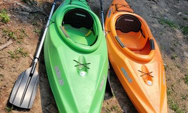 Two 10-foot sit-in kayaks in Trego, Montana (in Kootenai National Forest).