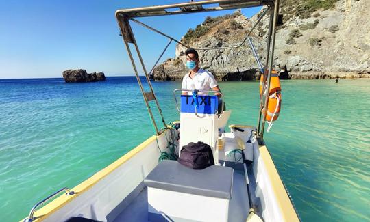 Barco tradicional en Sesimbra - Cuevas y playas salvajes