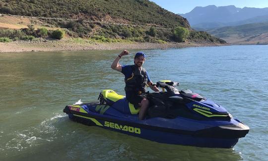 Here she is with me driving her. This jet ski is like a small boat. It can pull two people on a tube and have two people on the ski.