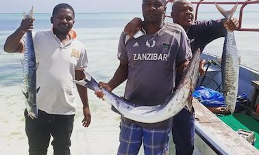 Viagem de dia inteiro de pesca em alto mar e mergulho com snorkel em Mnemba