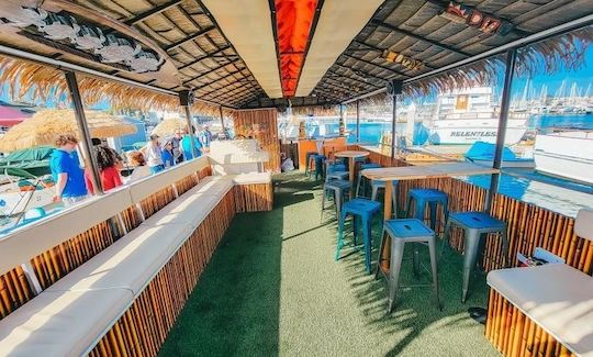 Tiki boat for up to 30 guests! Cocktails, dancing, & swimming on San Diego Bay!