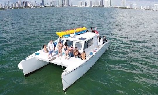 3 hours EXCURSION Catamaran PARTY BOAT JET SKIS BANANA WATERSPORTS TOUR DRINKS