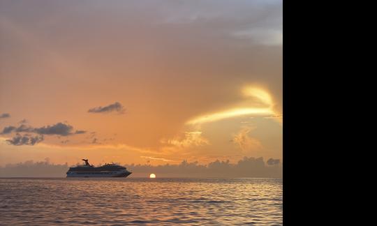 Beautiful sunrise as carnival cruise approaches the  Port of Nassau