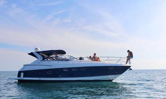 Cruise & Paddle Onboard a Luxury 40' Regal Yacht! *2 SUPs Included*